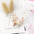 Elegant rose gold Christmas deer head brooch featuring delicate white pearls on antlers - Deer Head (E-2)