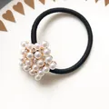 Elegant black elastic hair tie featuring a star-shaped pearl and rhinestone ornament - Five-Pointed Star Pearl Elastic