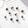 Juego de lindos broches decorativos de esmalte negro en varias formas sobre blanco. - Paquete de 10 / Negro (Patrón de Ratón)