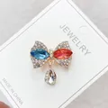 Elegant bow brooch with blue and red crystals and a teardrop pendant for women's fashion - Color Block Bowknot Rhinestone Style (A10-64)