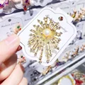 Eleganter Süßwasserperlen-Sonnenstrahl-Brosche mit funkelnden Strasssteinen in Gold - Radialer Stern Stil