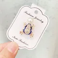 Eleganter kreativer Frosch-Brosche-Anstecker mit funkelnden Strasssteinen und Kunstperle - Blau Gold Frosch-Stil (A10-13) / Blau