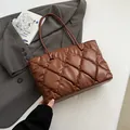 Elegant brown quilted puffy tote bag featuring large capacity for winter style - Brown