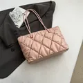 Premium pink quilted tote bag featuring large capacity and soft texture for winter commuting - Pink