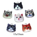 Close-up of 17x17mm alloy cat head charms with realistic printed patterns for DIY jewelry. - 6 Pieces Per Pack / Mixed Colors