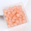 Perles en verre rose 8mm en forme de tonneau avec finition imitation jade en boîte transparente - Lot de 30 / Rose chair