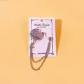 Eleganter silberner Flamingo-Anstecknadel mit doppelter Quastenkette und Kristallen - Flamingo-Form (37) / Silber