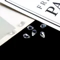 Heldere gefacetteerde glazen druppelkralen voor handgemaakte sieraden en accessoires - druppel / 10 Stuks/Verpakking (5X8mm) / AB Wit