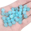 Translucent 8x7mm light blue glass apple beads with faux jade finish for DIY jewelry - Blue