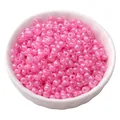 Vibrant 4mm glossy pink glass seed beads displayed in a white bowl for DIY jewelry crafts - 4mm (15g/Pack) / Rose Red