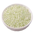 4mm cream pearlescent glass seed beads for DIY jewelry making presented in a white bowl - 4mm (15g/Pack) / Yellow-Green