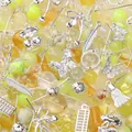 Assorted collection of yellow glass beads and silver alloy charms for DIY jewelry making kits - Golden Land / 30g/Pack / Silver