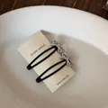 Élégantes barrettes à cheveux minimalistes en métal noir avec des accents de nœuds - Style Nœud Évidé (5#) / Lot de 2 / Argent