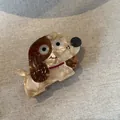 Detailed view of a cute dog-shaped acetate hair claw clip with a marble brown texture. - Large Cartoon Dog Hair Claw / Marble Coffee