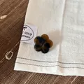 Detail of tortoiseshell acetate flower hair clip with wer wer engraving. - 2.5cm / Dark Leopard Flower Hair Clip