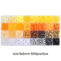 Kit di perle fai da te 32 scomparti con 640 perle a barilotto 9x6mm per bigiotteria - Serie Giallo-Caffè / 9x6mm (640 Pezzi)