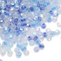 Gefacetteerde iriserende blauwe en heldere bicone kristallen kralen voor sieraden - Diepzeeblauwe Mix