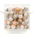 10mm glass beads featuring peach and gold marble ink patterns inside a clear storage box - Color 61