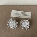 Macro detail of firework stud earrings with marquise zircon and white pearls - Style 18 Earrings