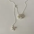 Detailed close-up of elegant white pearl grape bunch pendant on silver ball chain - Pearl-Style Necklace (Gold Plated) / White