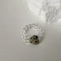 Close-up of beaded elastic ring with dalmatian stone heart and clear crystals - Dalmatian Jasper Heart Style / Elastic Style / Spotted Color