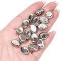 Macro view of metallic silver pebble-shaped CCB loose beads for DIY jewelry making - Large Bean (BSE045)
