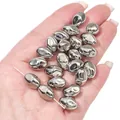 Macro detail of high-shine silver metallic bean-shaped CCB beads for DIY jewelry making - Rhombus (BSE045)