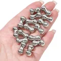 Close-up macro view of silver metallic bone-shaped CCB beads for DIY jewelry making. - Bone (BSE045)
