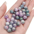 Iridescent aurora glass beads for DIY jewelry held in hand to show size and texture - 20 Pieces (10mm Hole Approx 1mm) / No.2 Aurora Blue