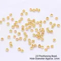 High-quality 2.0mm gold filled spacer beads with 1mm aperture for DIY jewelry making - 2.0mm Crimp Beads / 100pcs Pack / 14K Gold