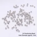 High quality 2.0mm silver positioning crimp beads with 1mm hole for DIY jewelry making - 2.0mm Crimp Beads / 100pcs Pack / Platinum Plated
