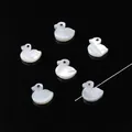Perles en nacre naturelle en forme de canard pour la création de bijoux artisanaux DIY - Canard / 9x10mm, 1 Pièce/Paquet / Blanc