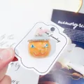 Halloween pumpkin brooch with enamel witch hat and sparkling rhinestones on display card - Orange Pumpkin With Witch Hat (A7-125)