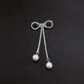 Elegant silver bow brooch featuring sparkling rhinestone tassels and white dangling pearls - Bowknot Tassel Artificial Pearl Style (A3-81)