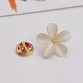 Detailed macro view of an elegant five-petal cat's eye stone flower brooch pin - Opal Flower Style (A9-87)