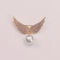 Elegant gold alloy angel wings brooch with sparkling rhinestones and a large white pearl. - Gold Pearl Wings (A5-87)