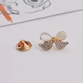 Close-up of elegant butterfly brooch with cat eye stones and sparkling rhinestones - Rhinestone Bow Style (A9-89)