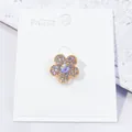 Eleganter goldfarbener Blumen-Brosche mit funkelnden klaren und irisierenden Strasssteinen - Blumenstil / Gold