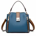 Sac seau classique en cuir grainé bleu pour femme avec poignées marron et accents dorés - Bleu