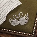 Silver alloy double swan brooch with sparkling white crystals and rhinestones - Double Swan Style (A15-105) / Silver