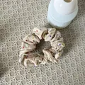 Linen beige scrunchie hair tie with small colorful heart prints for daily hair styling - Milk Tea Colorful Heart Scrunchie