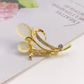 Elegant gold tulip brooch with yellow cat's eye stone and crystal rhinestone accents - Golden Cat's Eye (A10-113)