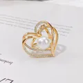 Eleganter goldener Herz-Schalring mit großer Perle und funkelnden Strasssteinen - Drei-Ring-Herz-Perlenstil (H3)