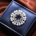 Elegant floral brooch with pearls and sparkling rhinestones for women's outfits - Silver Hollow Flower Cluster (A16-111)