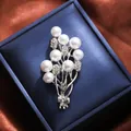 Elegant flower bouquet brooch with white pearls and sparkling rhinestones on jewelry box - Silver Bouquet Bowknot (A16-121)