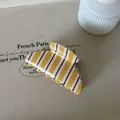 Pince à cheveux à rayures jaunes et blanches, finition brillante, style élégant. - Pince à Cheveux en Forme d'Arc (11#)