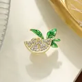 Elegant lemon slice brooch with sparkling rhinestones and green enamel leaves design. - Lemon Slice Style / Lemon Yellow (A20-75)