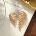 Vintage style gold angel wing feather alloy brooch for women with crystal rhinestones - Vintage Gold Feather Style (A20-64)