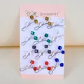 Detailed view of colorful cube bead U-shaped scarf clips on a pink display card - Cubic Colored Bead Style / Set of 12