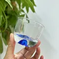 Japanese style handcrafted clear glass tea cup featuring a unique blue mountain base - Blue Base